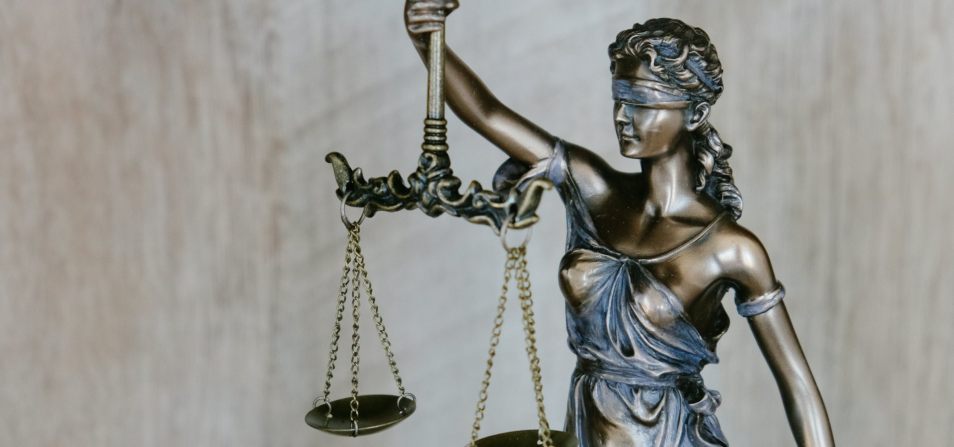 Statue of Lady Justice holding the scales of justice