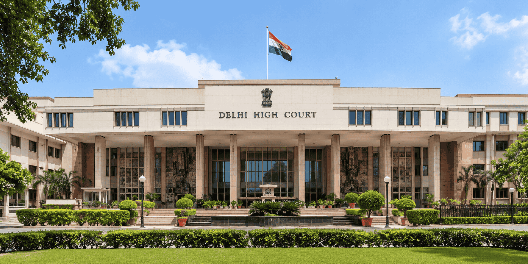 Front view of the Delhi High Court with the national flag
