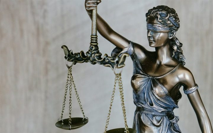 Statue of Lady Justice holding the scales of justice