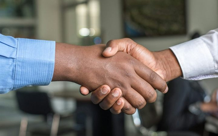 Business handshake after a legal consultation