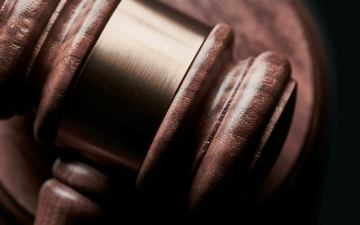 Judge's gavel on a sounding block